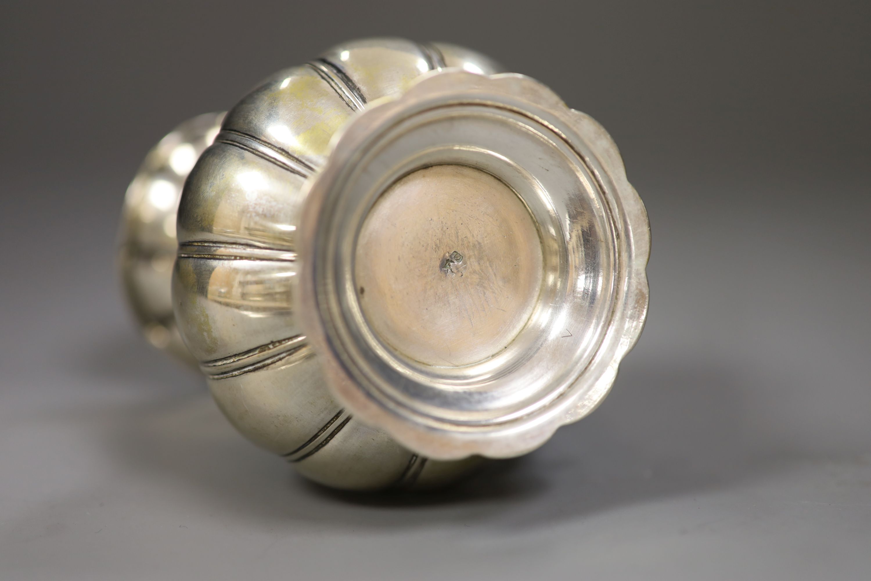 A 19th century continental white metal cream jug, 15.3cm, 9oz.
